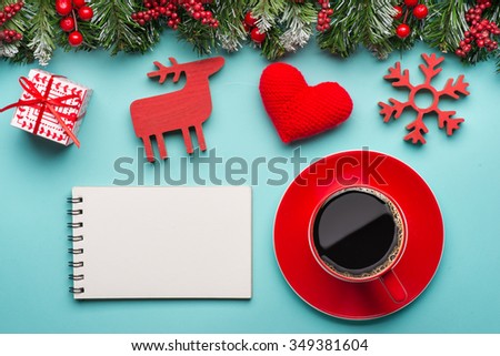Boxes with gifts on a blue cyan background. White notepad. Happy new year. Space for text. Colorful Concept. New Year background. Christmas. Xmas. Noel.