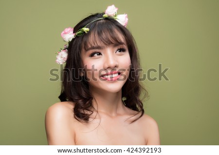 https://thumb1.shutterstock.com/display_pic_with_logo/2543926/424392193/stock-photo-beautiful-asian-woman-portrait-beauty-girl-with-flowers-hairstyle-perfect-makeup-beauty-fashion-424392193.jpg