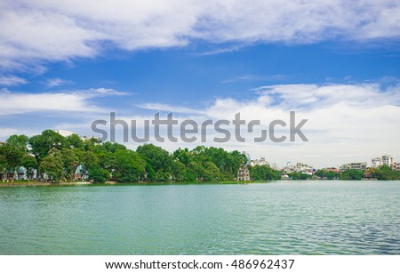 Hanoi, Vietnam - Sept 1, 2016: HoanKiem Lake, the little lake in the old part of Hanoi, Vietnam, with the Turtle Tower. Turtle Tower is the symbol of Hanoi,Vietnam. HoanKiem lake is center of Hanoi