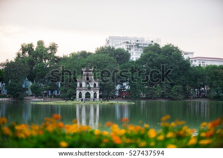 HoanKiem Lake, the little lake in the old part of Hanoi, Vietnam, with the Turtle Tower. Turtle Tower is the symbol of Hanoi,Vietnam. HoanKiem lake is center of Hanoi