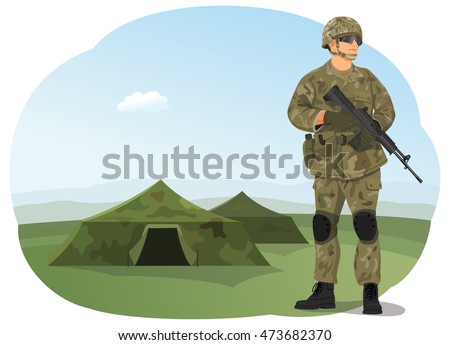 Soldier in uniform, ready to fight. Army camp. Military tents on the background.