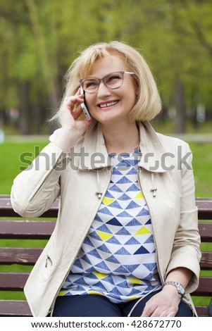 blonde with sunglasses Mature
