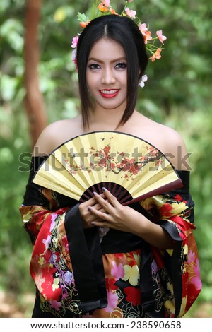 https://thumb1.shutterstock.com/display_pic_with_logo/2589682/238590658/stock-photo-portrait-asia-beautiful-japanese-kimono-women-and-japanese-geisha-women-with-folding-fan-and-238590658.jpg