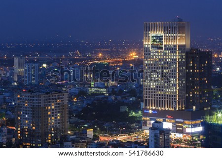 SAIGON, VIETNAM - DEC 23, 2016 : Impression landscape of Ho Chi Minh city at night , Saigon river flows through the city, this photo was taken at Sai Gon pearl building.