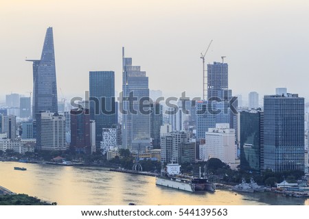 SAIGON, VIETNAM - DEC 23, 2016 - Impression landscape of Ho Chi Minh city at night , Saigon river flows through the city, this photo was taken at Sai Gon pearl building.