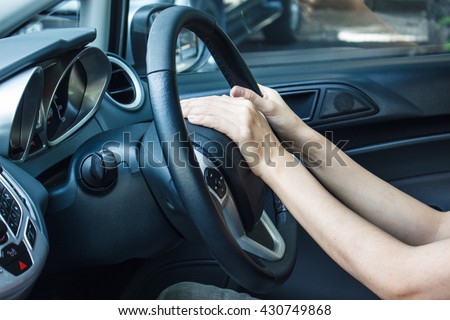 https://thumb1.shutterstock.com/display_pic_with_logo/2621836/430749868/stock-photo-beeping-car-driver-woman-in-luxury-car-430749868.jpg