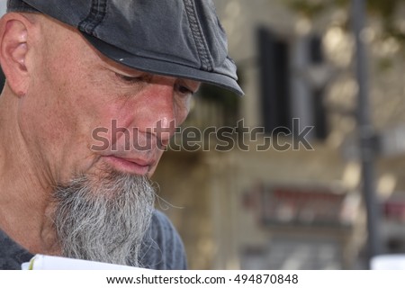 Marseille, France - October 06, 2016 : French cartoonist Jean-Michel Gruet at the 5th edition of the International festival of press and political cartoons at l'Estaque.