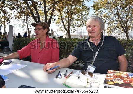 Marseille, France - October 06, 2016 : French cartoonists Patrick Redon Red and Philippe Umbdenstock Phil at the 5th edition of the International festival of press and political cartoons at l'Estaque.
