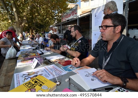Marseille, France - October 06, 2016 : French cartoonists at the 5th edition of the International festival of press and political cartoons at l'Estaque.
