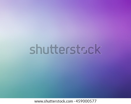 Abstract gradient purple blue teal colored blurred background.