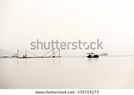 sunrise on thung nai lake , hoa binh , viet nam