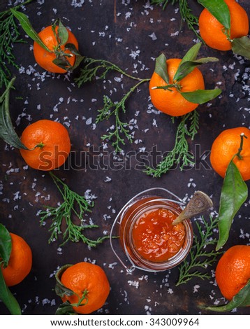 Tangerine jam in a glass jar.A traditional dessert at Christmas and New year.