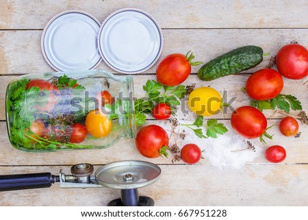 Preservation, pickling vegetables of tomatoes and cucumbers. Selective focus. 