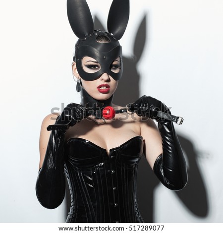 Brunette mistress win leather costume Brunette mistress win leather costume