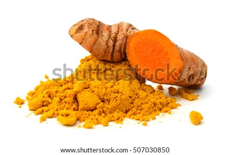 Turmeric roots with turmeric powder on white