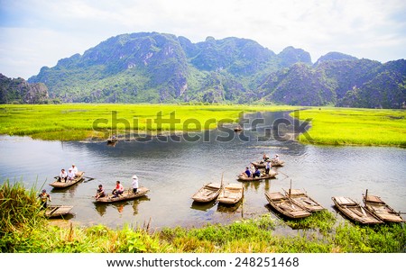 VANLONG , VIETNAM - MAY 11 : The fall comes late in Van Long - Ninh Binh on May 11 , 2014 . Van Long - The famous eco-tourism of Ninh Binh,Vietnam