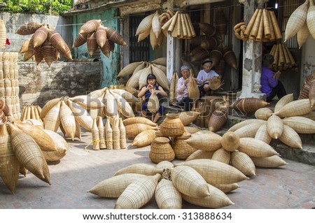 HUNGYEN, VIETNAM - JUNE 21 :Unidentified people weaving bamboo on June 21, 2015 in HungYen, Vietnam. Weaving this tools that used to catch fish is traditional occupation in Hung Yen province.