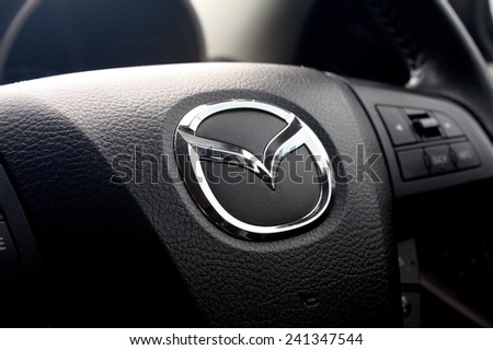 BANGKOK, THAILAND - DECEMBER 31, 2014: Logo of Mazda car on steering wheel on December 31,2014 in Bangkok Thailand.