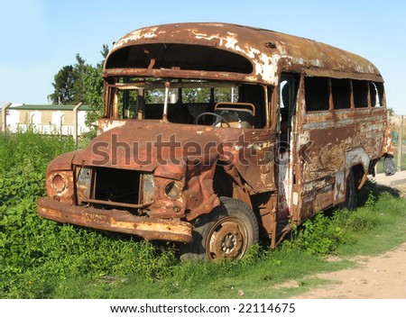 stock-photo-old-bus-abandoned-and-rusty-rosario-city-argentina-22114675.jpg