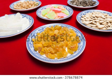 Amazing of Vietnamese food for Tet holiday in spring, jam is traditional food on lunar new year, make from sweet potato, lotus seed, ginger, mango with sugar, colorful background for Vietnam culture