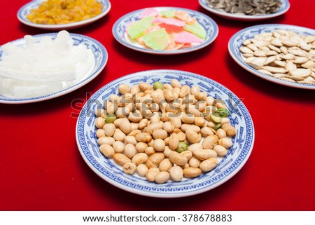 Amazing of Vietnamese food for Tet holiday in spring, jam is traditional food on lunar new year, make from sweet potato, lotus seed, ginger, mango with sugar, colorful background for Vietnam culture
