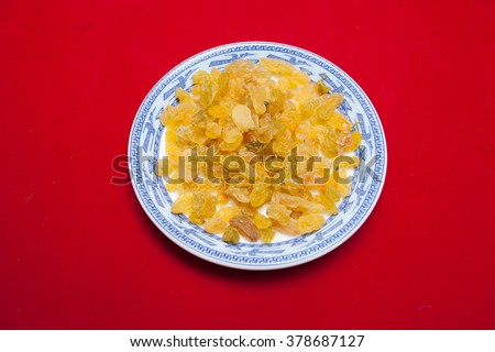 Vietnamese food for Tet holiday in spring, jam is traditional food on lunar new year, can make from sweet potato, lotus seed, ginger with sugar, colorful background for Vietnam custom