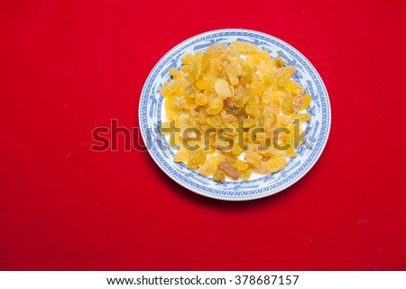 Vietnamese food for Tet holiday in spring, jam is traditional food on lunar new year, can make from sweet potato, lotus seed, ginger with sugar, colorful background for Vietnam custom