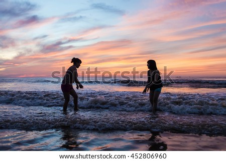 Thanh Hoa, Vietnam , Aug 13 2015 , group of friends splashing water in the sea at samson beach, Thanh Hoa. people and fun