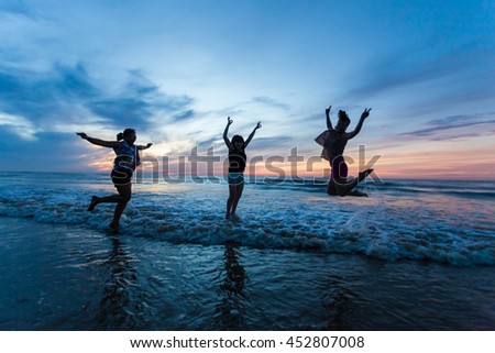 Thanh Hoa, Vietnam , Aug 13 2015 , group of friends splashing water in the sea at samson beach, Thanh Hoa. people and fun