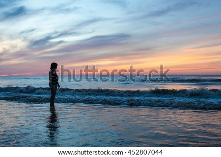 Thanh Hoa, Vietnam , Aug 13 2015 , group of friends splashing water in the sea at samson beach, Thanh Hoa. people and fun