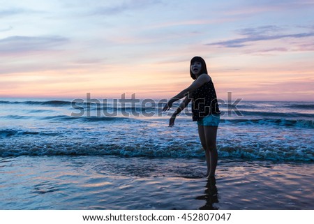 Thanh Hoa, Vietnam , Aug 13 2015 , group of friends splashing water in the sea at samson beach, Thanh Hoa. people and fun
