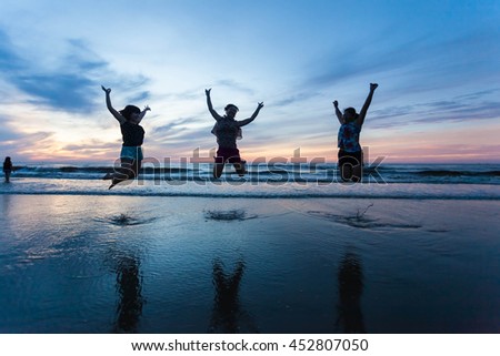 Thanh Hoa, Vietnam , Aug 13 2015 , group of friends splashing water in the sea at samson beach, Thanh Hoa. people and fun