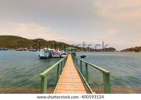 Hang Rai beach, Ninh Thuan province, Vietnam - March 27, 2016: pier to the sea at Vietnamese beach, Ecotourism at Hang Rai Vietnam, Phan Rang city, Ninh Thuan, coastal countryside, amazing ancient