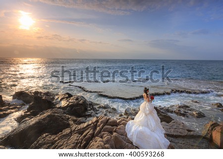Hang Rai beach, Ninh Thuan province, Vietnam - March 27, 2016 : happy bride on the beach near the ocean at ecotourism at Hang Rai Vietnam, Phan Rang city, Ninh Thuan, coastal countryside, amazing