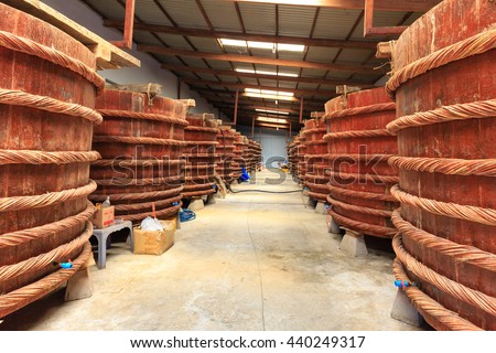 Phu Quoc island, Kien Giang province, Vietnam - May 02, 2016 : at factory fish sauce production facilities on Phu Quoc island by traditional fermented method of anchovies fermented brewed in large