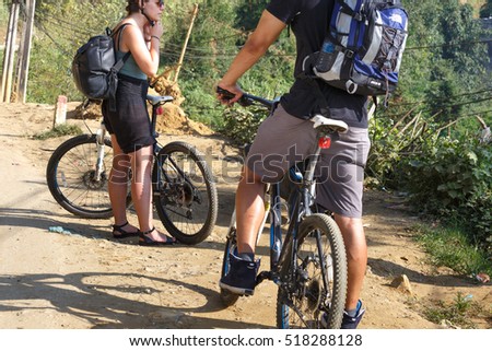 Sa Pa, Lao Cai province, Vietnam - September 27, 2016 : the foreign tourists in Sapa enjoyed cycling on the rugged mountain pass road. this is the favorite sport of them