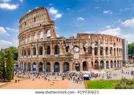 Colosseum with clear blue sky and clouds, Rome,Italy. Rome architecture and landmark. Rome Colosseum is one of the best known monuments of Rome and Italy
