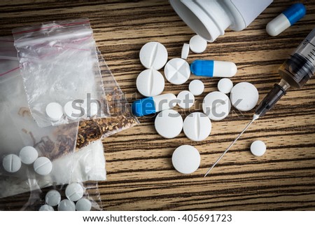 Drug syringe and cooked heroin