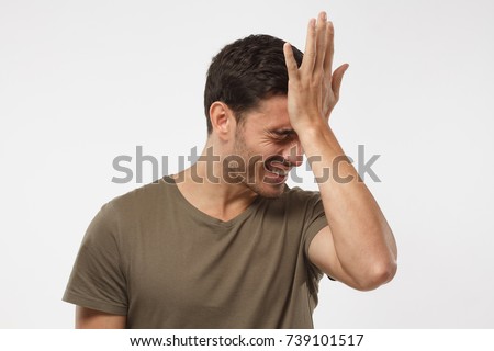stock-photo-disappointed-stressed-out-guy-making-facepalm-gesture-with-hand-face-palm-concept-739101517.jpg