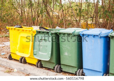 The waste sorting trash bins by color.Recycling bins