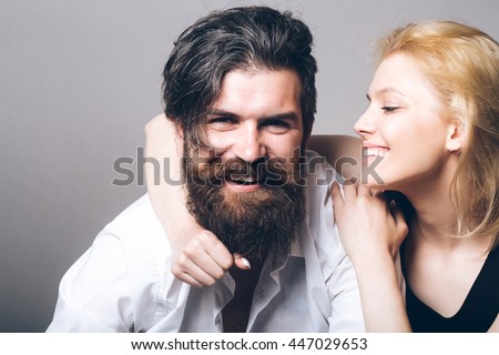 https://thumb1.shutterstock.com/display_pic_with_logo/2810074/447029653/stock-photo-young-happy-couple-of-pretty-woman-with-blonde-hair-and-handsome-bearded-man-with-long-beard-447029653.jpg