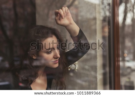 Girl Behind The Glass