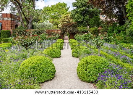 Beautiful English Flower Garden beautiful english style garden hedges symmetrical stock photo Beautiful English Flower Garden beautiful english style garden hedges symmetrical stock photo