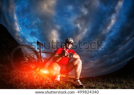 stock-photo-the-guy-with-the-bike-on-top