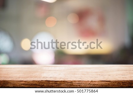 stock photo empty wooden desk space and blurry background of restaurant vintage tone for product display 501775864