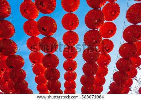 Chinese red lanterns hanging at street for decoration during the Chinese New Year festival at Chinatown, Ratchaburi, Thailand
Red lamps decoration with blue sky