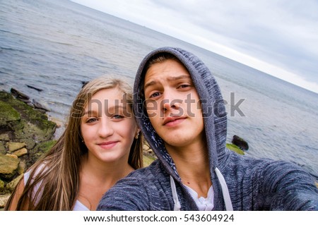 https://thumb1.shutterstock.com/display_pic_with_logo/2942620/543604924/stock-photo-selfie-happy-beautiful-couple-on-the-coast-543604924.jpg