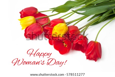 Beautiful greeting Card with text Happy Women's Day for International Women's Day, March 8. Red and yellow Tulips Flowers lie on white Background. Horizontal Image