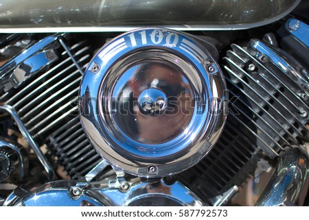 Subotica, Serbia-February 25,2017:Green Yamaha DragStar 1100 motorcycle in front of the garage, photographed on a nice sunny day. Ready for restoration. Lot of chrome detail.