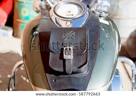 Subotica, Serbia-February 25,2017:Green Yamaha DragStar 1100 motorcycle in front of the garage, photographed on a nice sunny day. Ready for restoration. Lot of chrome detail.